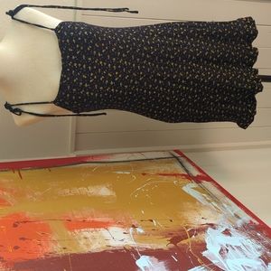 Spring spaghetti strap dress. Stretchy, adjustable tie straps.